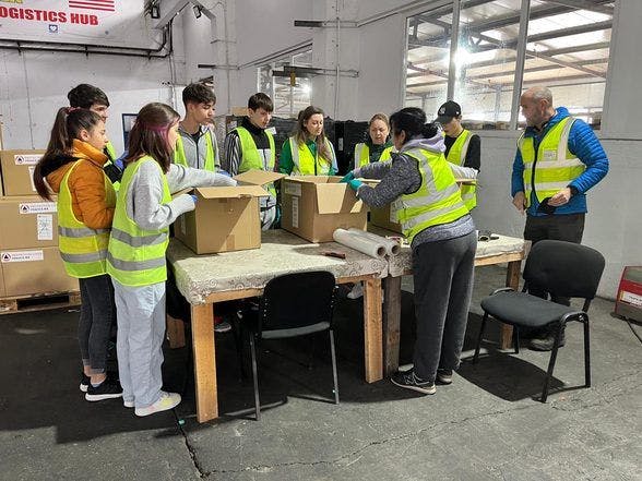 Students with NOROC helped prepare aid for shipment at the Tulcea Humanitarian Logistics Hub  NOROC